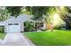 Charming single Gathering home with well-maintained lawn, mature trees, and a one car garage at 1145 Bellwood Rd, Charleston, SC 29412
