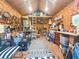 A shed featuring ample storage space with tools, lawn equipment, and miscellaneous items neatly organized at 1145 Bellwood Rd, Charleston, SC 29412