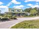 Beautiful single story home featuring a classic exterior, lovely porch and landscaped garden at 115 Golfview Ln, Summerville, SC 29485