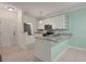 Well-lit kitchen features granite countertops, white cabinets, and stainless steel appliances at 115 Golfview Ln, Summerville, SC 29485
