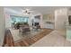Inviting living room featuring a fireplace and open design with a seamless transition to the dining area at 115 Golfview Ln, Summerville, SC 29485