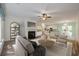 Bright living room with fireplace, ceiling fan, and an open concept at 115 Golfview Ln, Summerville, SC 29485