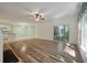 Open living area with hardwood floors, a fireplace, and sliding glass doors to the backyard at 115 Golfview Ln, Summerville, SC 29485