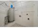 Water heater in unfinished basement storage room with plenty of shelving for organization at 115 Golfview Ln, Summerville, SC 29485