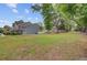Expansive backyard with mature trees, offering a serene outdoor space at 117 Macy Cir, Goose Creek, SC 29445