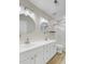 Modern bathroom with double sinks, sleek fixtures, and a glass-enclosed shower for a spa-like experience at 117 Macy Cir, Goose Creek, SC 29445