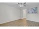 Bright bedroom featuring wood-look floors, neutral walls, and a ceiling fan for a fresh and inviting space at 117 Macy Cir, Goose Creek, SC 29445
