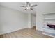 This bedroom has a ceiling fan, wood flooring and shelving for storage at 117 Macy Cir, Goose Creek, SC 29445