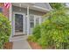 Inviting front entrance with well-maintained landscaping and a welcoming pathway at 117 Macy Cir, Goose Creek, SC 29445