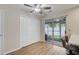 Kitchen area featuring a sliding glass door leading to the patio, vinyl floors, and closet doors at 117 Macy Cir, Goose Creek, SC 29445