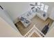 Bright living room with sectional sofa, throw pillows, and an entertainment center viewed from above at 117 Macy Cir, Goose Creek, SC 29445