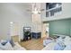 Bright living room with vaulted ceiling, wood floors, and a comfortable sectional sofa with access to upstairs at 117 Macy Cir, Goose Creek, SC 29445