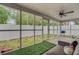 Sunroom featuring screen windows, a ceiling fan, a sitting area, and backyard views at 117 Macy Cir, Goose Creek, SC 29445
