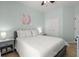 Inviting bedroom featuring a cozy bed, a ceiling fan, and bright, natural light at 1179 Holly Bend Dr, Mount Pleasant, SC 29466