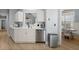 Charming kitchen featuring white cabinets, stainless steel appliances, and an eat-in dining area at 1179 Holly Bend Dr, Mount Pleasant, SC 29466