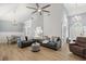 Spacious living room with vaulted ceiling, plenty of seating, plank flooring, and natural light at 1179 Holly Bend Dr, Mount Pleasant, SC 29466