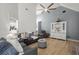 Bright and airy living room with vaulted ceiling, modern decor, plank flooring, and custom built-ins at 1179 Holly Bend Dr, Mount Pleasant, SC 29466