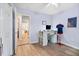Bedroom features a modern desk, chair, and ample natural light perfect for a home office at 1227 Ocean View Rd, Charleston, SC 29412