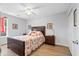 This bedroom is brightly lit and has wood laminate flooring with neutral walls, along with a nice bed at 1227 Ocean View Rd, Charleston, SC 29412
