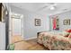 The bedrooms features laminate flooring, neutral colored walls, and a window for plenty of natural light at 1227 Ocean View Rd, Charleston, SC 29412