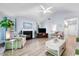 Spacious living room with vaulted ceilings, fireplace, and cozy seating arrangement at 1227 Ocean View Rd, Charleston, SC 29412