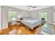 Bedroom with hardwood floors, ceiling fan, and generous natural light at 123 Azalea Dr, Summerville, SC 29485