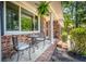 Inviting front porch with seating area, perfect for enjoying the outdoors at 123 Azalea Dr, Summerville, SC 29485