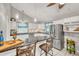 Well lit kitchen features granite counters, stainless steel appliances, and raised breakfast bar at 123 Azalea Dr, Summerville, SC 29485
