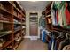 Walk-in closet with custom shelving that offers plenty of space for clothing, shoes and accessories at 1235 Sunset Dr, Charleston, SC 29407