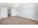 Neutral bedroom with plush carpeting, light-colored walls, and walk-in closet at 125 Gaslight Blvd, Summerville, SC 29483