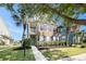 Charming two-story home with brick and siding, complemented by a landscaped front yard and a quaint second story balcony at 125 Gaslight Blvd, Summerville, SC 29483