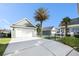 Spacious two-car garage with ample driveway parking and manicured landscaping at 125 Gaslight Blvd, Summerville, SC 29483