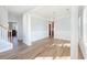 Bright, open living room features hardwood floors, crown molding, and natural light at 125 Gaslight Blvd, Summerville, SC 29483