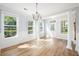Inviting room with hardwood floors and large windows that provide ample natural lighting at 125 Gaslight Blvd, Summerville, SC 29483