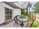 Outdoor patio with ample seating, a shade cover, and a grill perfect for entertaining guests at 1302 Aubry Dr, Moncks Corner, SC 29461