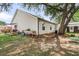 Expansive backyard with a shaded patio, garden bed, and storage shed at 1302 Aubry Dr, Moncks Corner, SC 29461