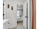 View from the bathroom of the bedroom, neutral color palette, natural light, and wood-look flooring at 1302 Aubry Dr, Moncks Corner, SC 29461