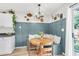 Charming dining area with banquette seating, a round table, and stylish decor at 1302 Aubry Dr, Moncks Corner, SC 29461