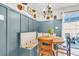 Bright dining nook featuring custom banquette seating and patio access at 1302 Aubry Dr, Moncks Corner, SC 29461
