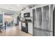 Modern kitchen with stainless steel appliances and a view of the outdoor patio at 1302 Aubry Dr, Moncks Corner, SC 29461