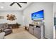 Comfortable living room with TV, cabinet, and seating at 1302 Aubry Dr, Moncks Corner, SC 29461