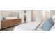 Comfortable bedroom with a wooden dresser, walk-in closet, and cozy ambiance at 141 Haventree Ct, Summerville, SC 29486