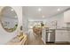 Bright kitchen with stainless appliances that opens to the living room at 141 Haventree Ct, Summerville, SC 29486
