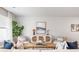 Bright living room featuring modern decor, stylish furnishings, and a large window at 141 Haventree Ct, Summerville, SC 29486