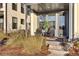 Inviting front porch with cozy seating, decorative plants, and a stylish entrance, creating a welcoming outdoor space at 157 Pocket Bend Cir, Summerville, SC 29486