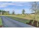 Scenic view of community green space with walking paths and landscaped areas at 157 Pocket Bend Cir, Summerville, SC 29486