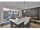 Open-concept kitchen with white countertops and a view to outdoor patio at 157 Pocket Bend Cir, Summerville, SC 29486