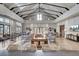 Open community space with cathedral ceilings, and stylish furnishings, perfect for relaxation and socializing at 157 Pocket Bend Cir, Summerville, SC 29486