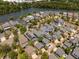 Overhead shot of neighborhood highlighting the community setting with a tranquil lake at 1588 Paradise Lake Dr, Mount Pleasant, SC 29464