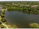 Beautiful aerial shot of a tranquil lake surrounded by verdant trees and greenery, creating a peaceful and natural setting at 1588 Paradise Lake Dr, Mount Pleasant, SC 29464